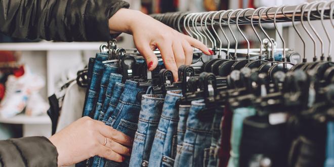 a woman shopping for jeans