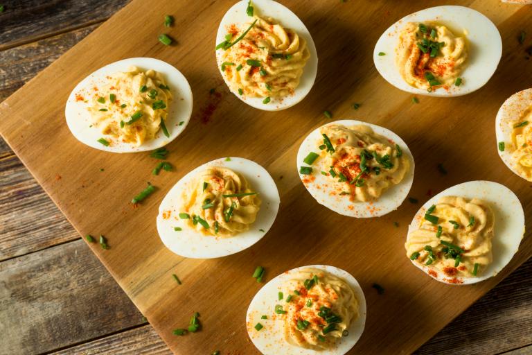 hard-boiled eggs on a cutting board